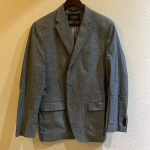 Please excuse the wrinkles. Outgrown, lightly used like new Blazer